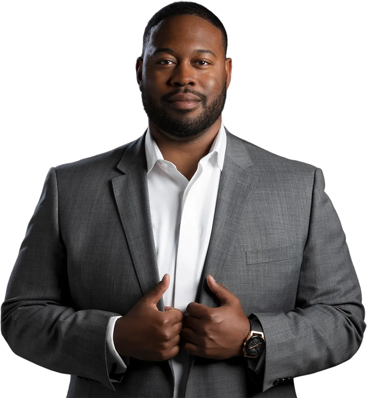 Attorney Robert Young IV stands in a suit